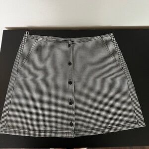 Black and white gingham Obey skirt with buttons